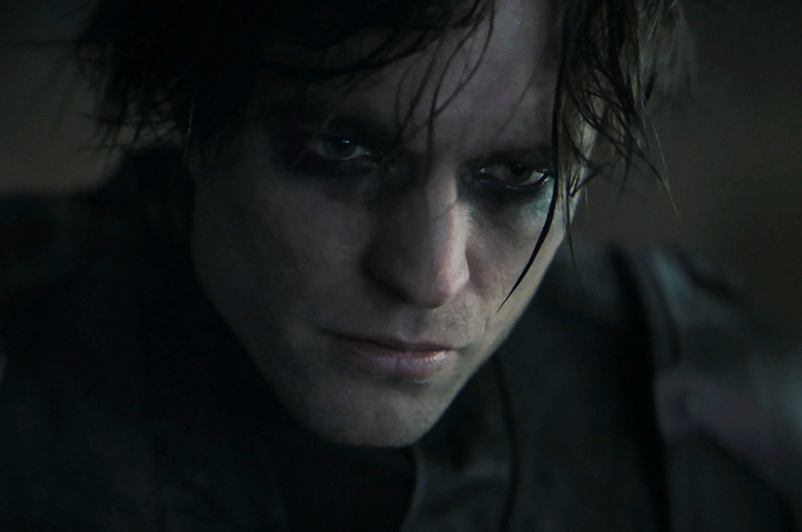 Robert Pattinson as the Dark Knight, in a scene from the film "The Batman." (Warner Bros. Pictures via AP)