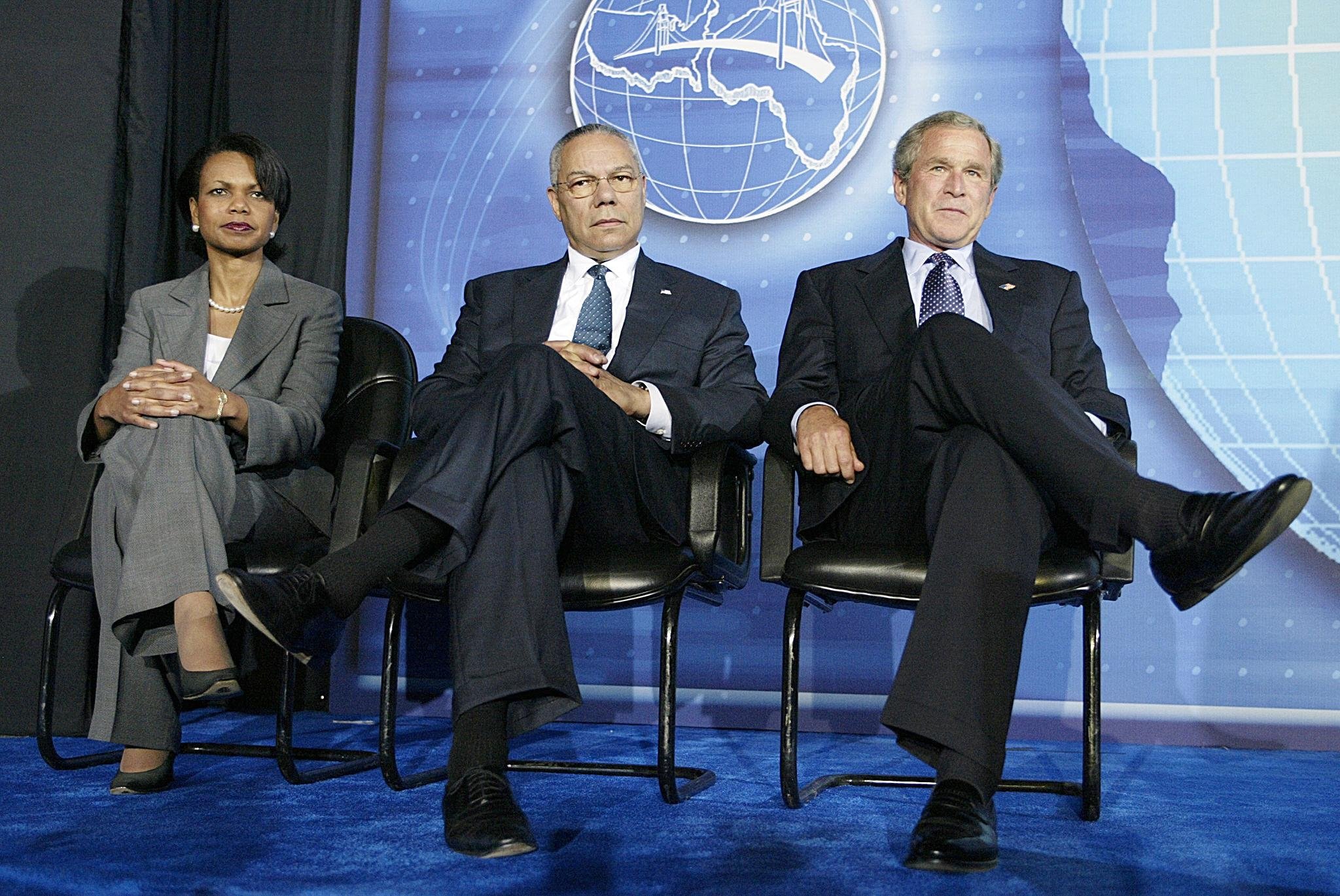 In this file photo taken on July 12, 2003, former US President George W. Bush (R), his National Security Advisor Condoleezza Rice (L), and former US Secretary of State Colin Powell (C) attend the Leon H. Sullivan Summit, at Congress Hall in Abuja, Nigeria. (AFP Photo)