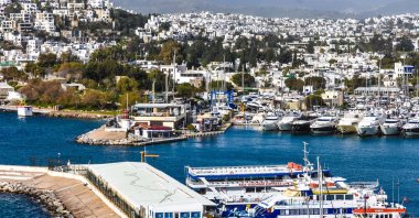 Boats and yachts are anchored around a marina, in Bodrum, Muğla, southwestern Turkey, Feb.10, 2021. (Photo by Getty Images)