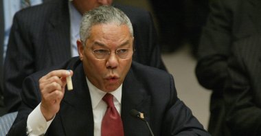 In this file photo taken on Feb. 5, 2003 US Secretary of State Colin Powell holds up a vial that he said was the size that could be used to hold anthrax as he addresses the United Nations Security Council (UNSC) at the U.N. in New York. (AFP Photo)