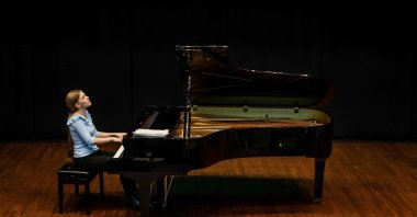 Eva Gevorgyan, 17, from Russia, one of the finalists of the 18th International Chopin Piano Competition, performs during a rehearsal at the Russian Culture Center in Warsaw, Poland, Oct. 11, 2021. (AFP Photo)