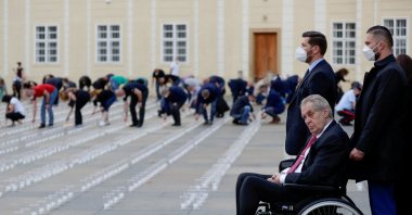 Czech President Milos Zeman watches as employees of Prague Castle light candles to commemorate the victims of the COVID-19 pandemic at Prague Castle in Prague, Czech Republic, May 10, 2021. (Reuters Photo)