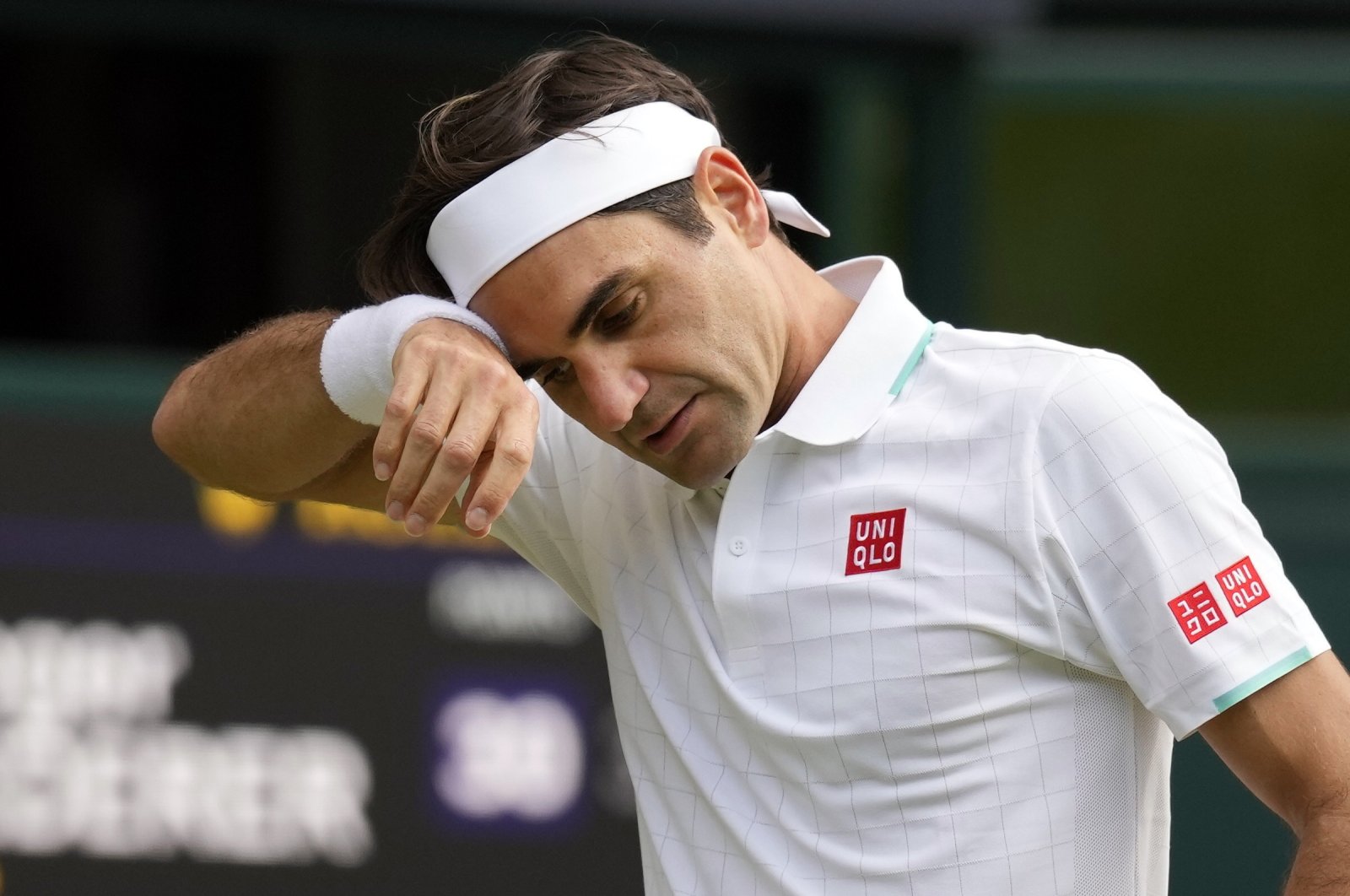 Switzerland's Roger Federer during the Wimbledon men's singles quarterfinal against Poland's Hubert Hurkacz in London, England, Aug. 5, 2021. (AP Photo)