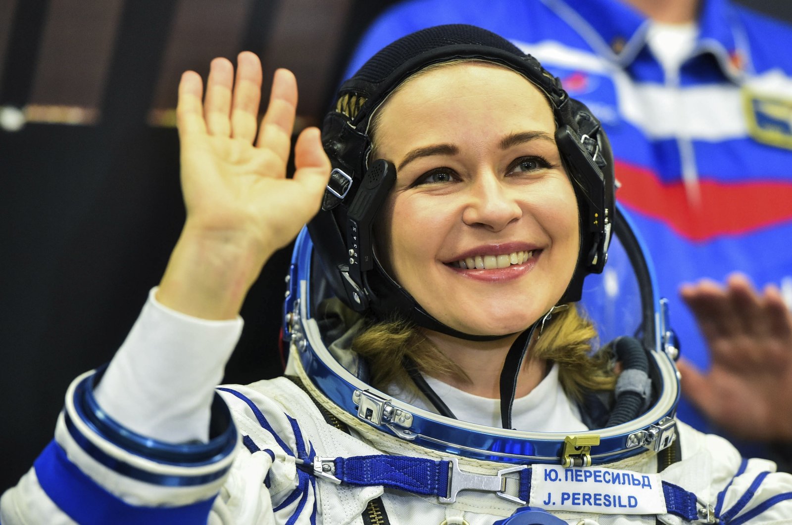 Actress Yulia Peresild waves prior to her launch to the International Space Station (ISS) at the Russian leased Baikonur cosmodrome, Kazakhstan, Oct. 5, 2021. (Roscosmos Space Agency via AP)