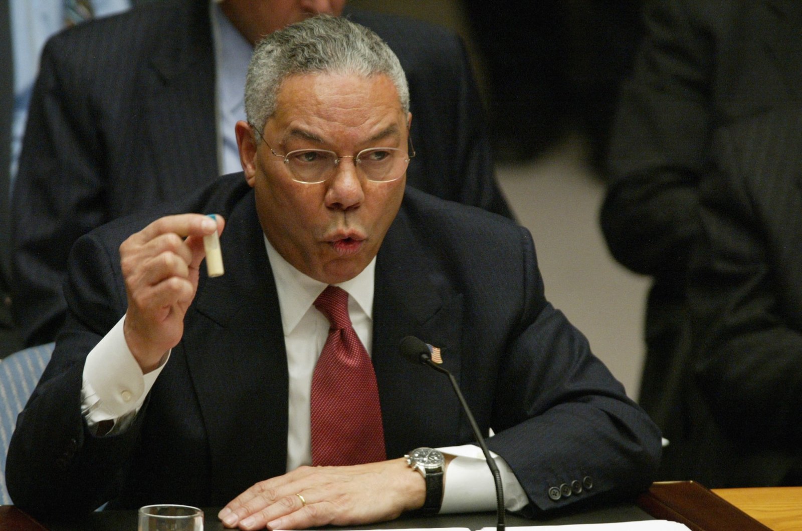 In this file photo taken on Feb. 5, 2003 US Secretary of State Colin Powell holds up a vial that he said was the size that could be used to hold anthrax as he addresses the United Nations Security Council (UNSC) at the U.N. in New York. (AFP Photo)