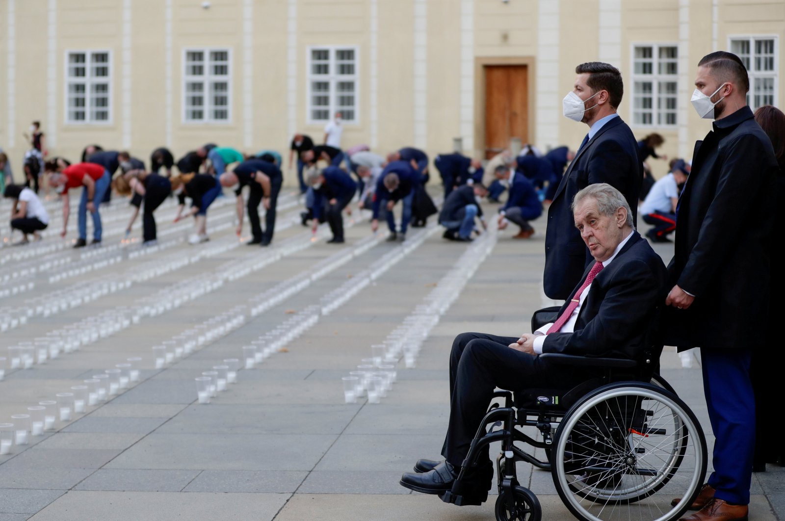 Czech President Milos Zeman watches as employees of Prague Castle light candles to commemorate the victims of the COVID-19 pandemic at Prague Castle in Prague, Czech Republic, May 10, 2021. (Reuters Photo)