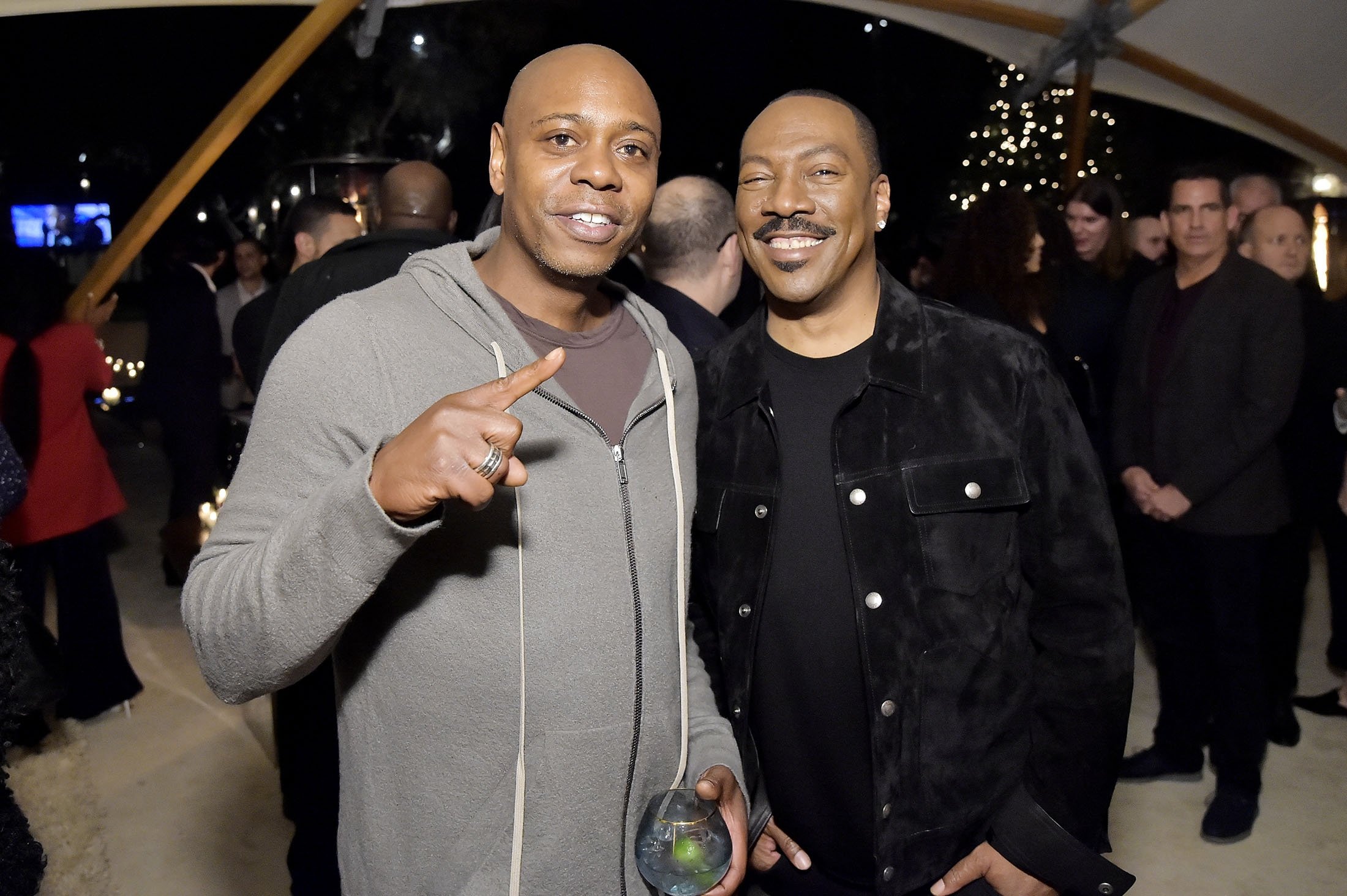 Dave Chappelle (L) and Eddie Murphy attend 'Celebrate the Season: Ted's Holiday Toast' in Beverly Hills, California, U.S., Nov. 15, 2019. (Getty Images)