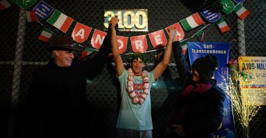 Italy's Andrea Marcato poses after winning the "Self-Transcendence 3100 Mile Race," the world's longest certified foot race, in Queens, New York, U.S., Oct. 17, 2021. (AFP Photo)