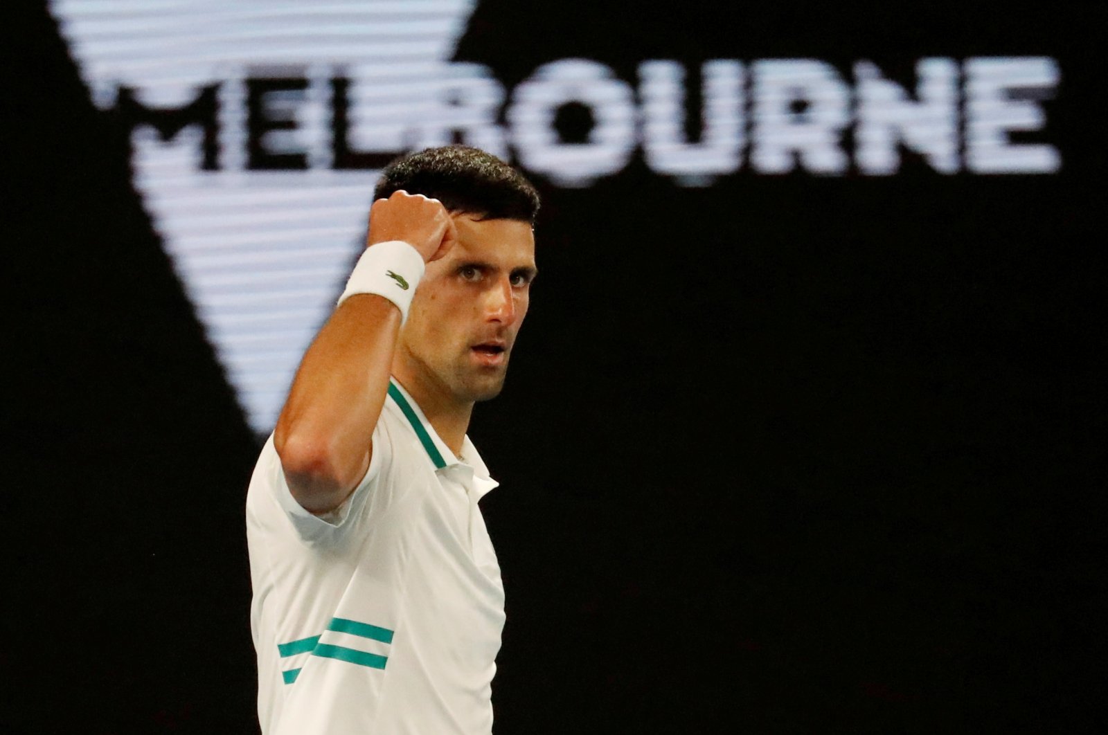 Serbia's Novak Djokovic reacts during the Australian Open final against Russia's Daniil Medvedev in Melbourne, Australia, Feb. 21, 2021. (Reuters Photo)