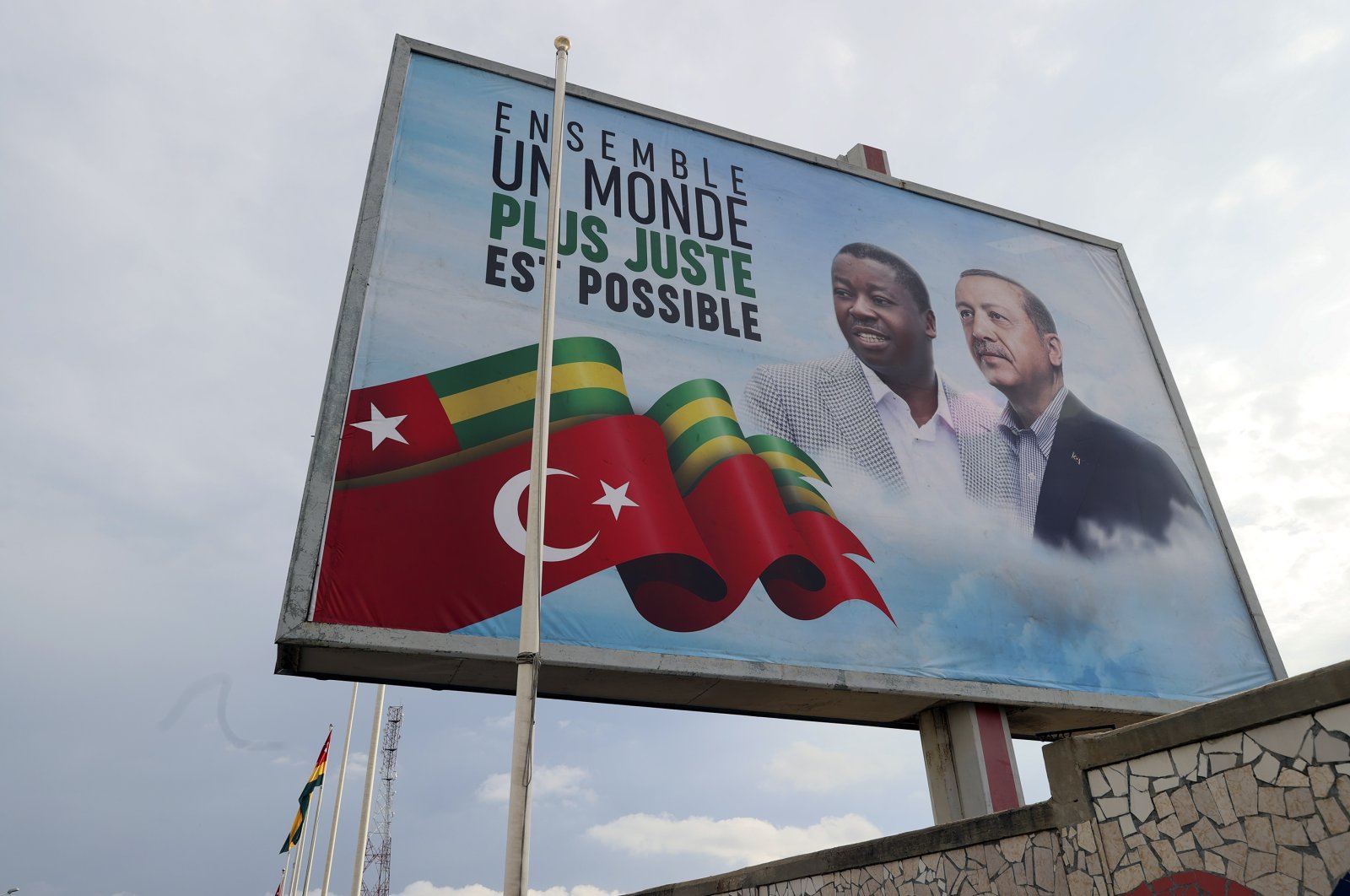 Posters of President Recep Tayyip Erdoğan and his Togolese counterpart Faure Gnassingbe with the words "Together a Fairer World is Possible" were seen in various parts of the capital Lome, Togo, Oct. 19, 2021. (AA Photo)