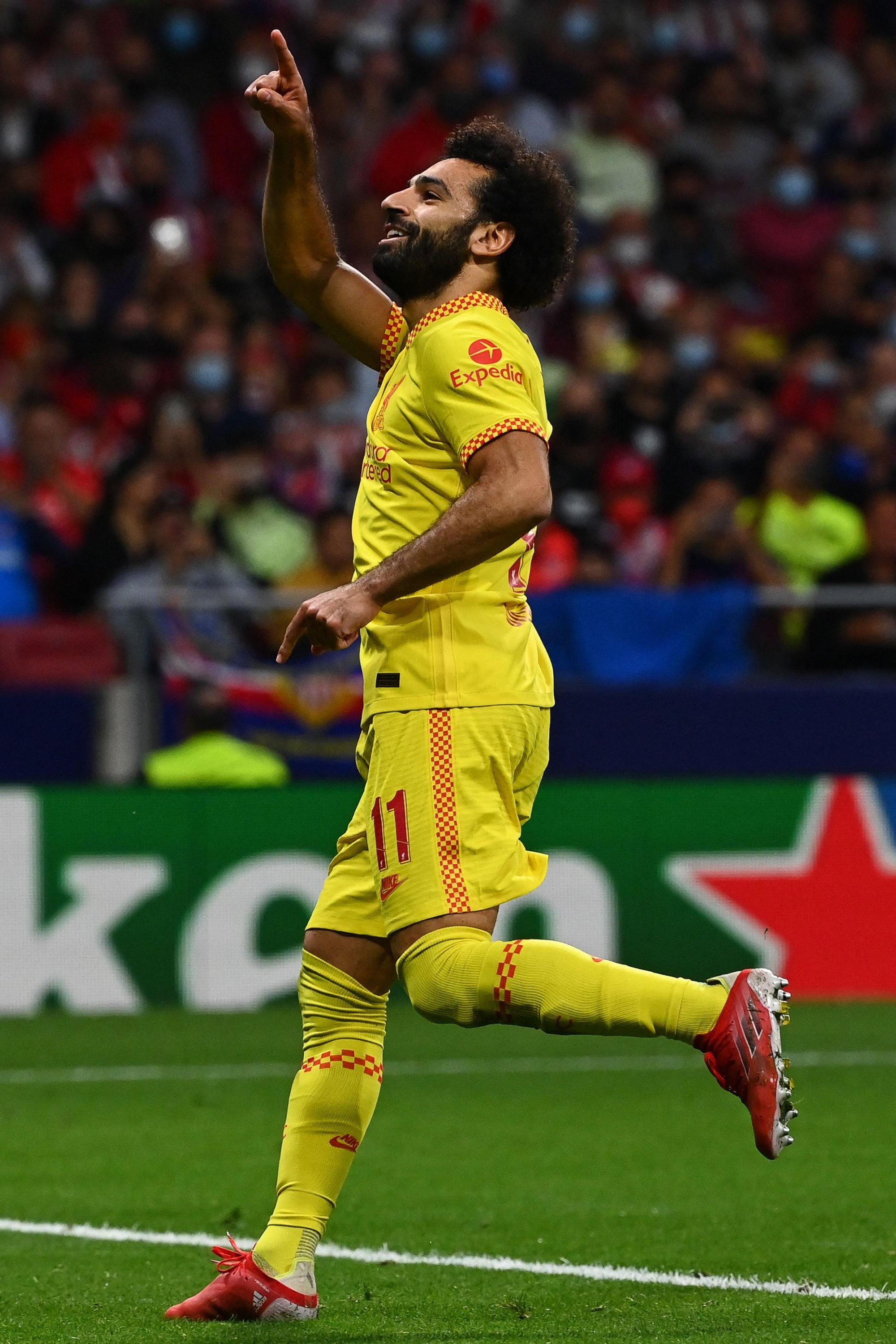 Liverpool's Mohamed Salah celebrates after scoring in the UEFA Champions League match against Atletico Madrid at the Wanda Metropolitano stadium, Madrid, Spain, Oct. 19, 2021. (AFP Photo)