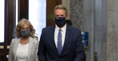 Former Republican Senator from Arizona and nominee for ambassador to Turkey Jeff Flake (R) walks with his wife Cheryl Flake, on Capitol Hill in Washington, D.C., U.S., Oct. 19, 2021. (EPA Photo)
