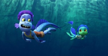 Alberto (L) and Luca are sea monsters who seek adventures on dry land in “Luca."