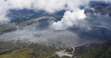Smoke rises from a crater of Mr. Aso, Kumamoto prefecture, southwestern Japan, Oct. 20, 2021. (AP Photo)