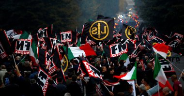 Supporters of Italy's far-right Forza Nuova party wave flags during a demonstration in Rome, Italy, Nov. 4, 2017. (Reuters Photo)