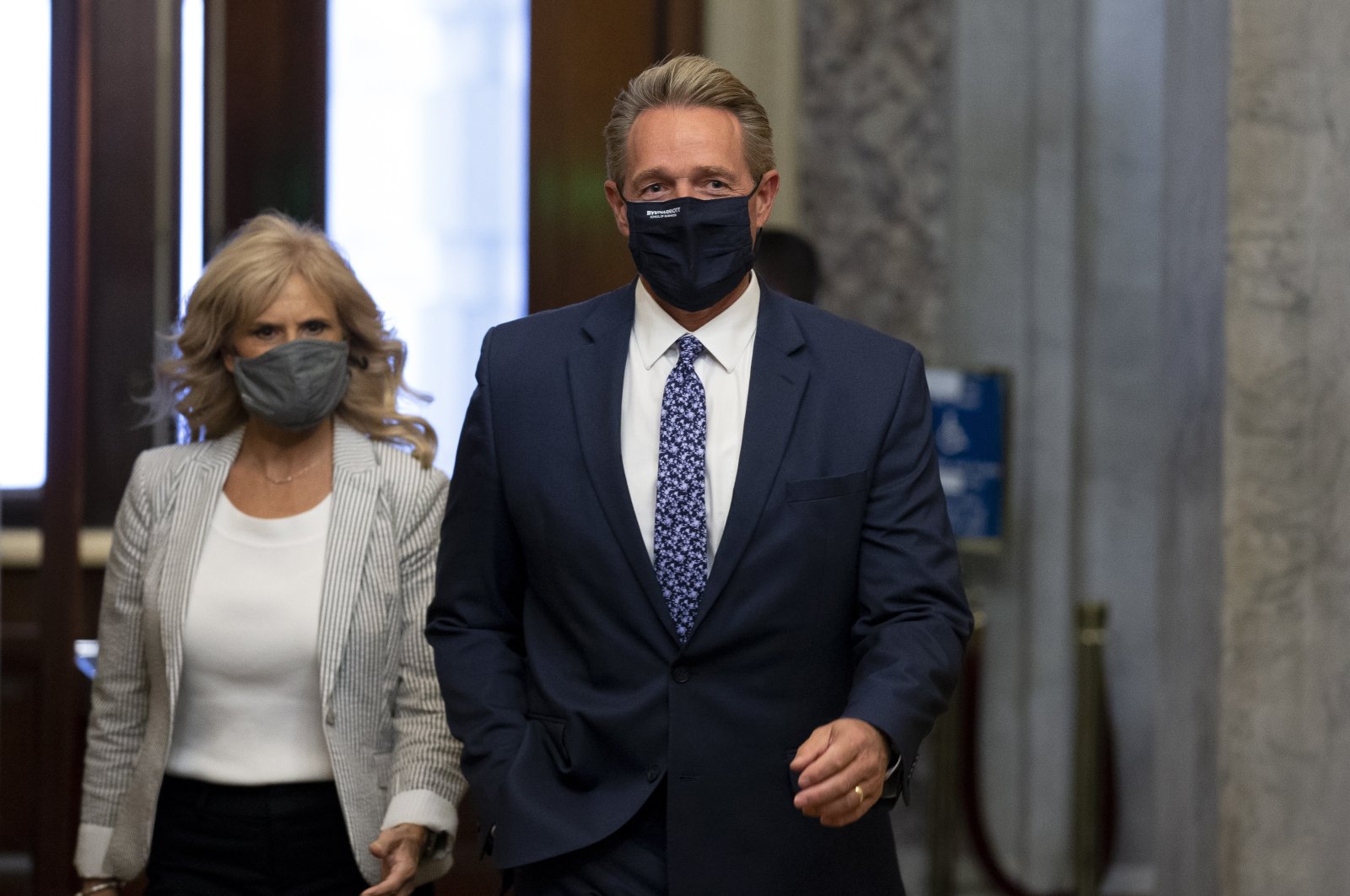Former Republican Senator from Arizona and nominee for ambassador to Turkey Jeff Flake (R) walks with his wife Cheryl Flake, on Capitol Hill in Washington, D.C., U.S., Oct. 19, 2021. (EPA Photo)
