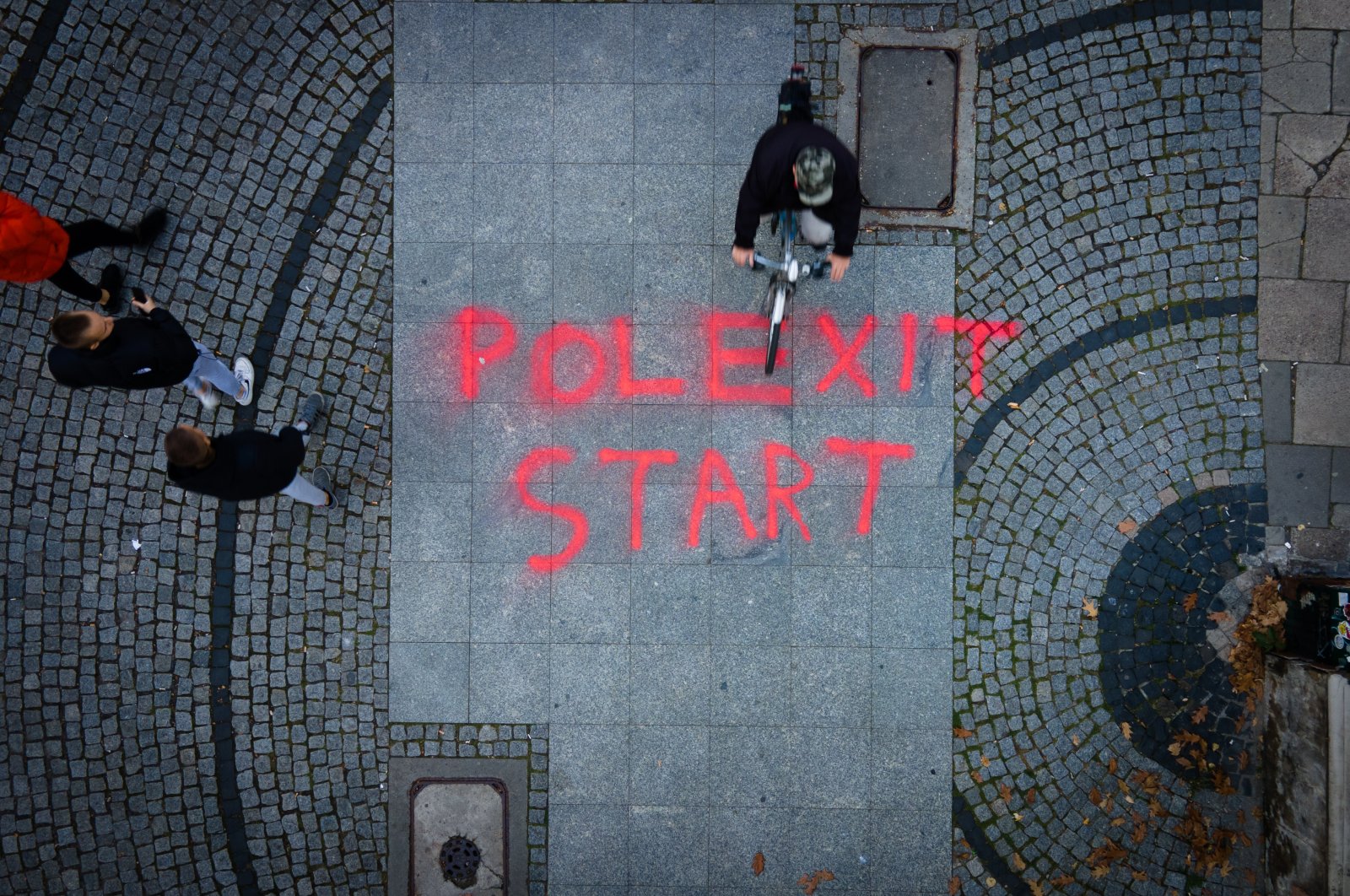 Graffiti reading "Polexit start" is seen in central Warsaw, Poland, Oct. 9, 2021. (Reuters Photo)