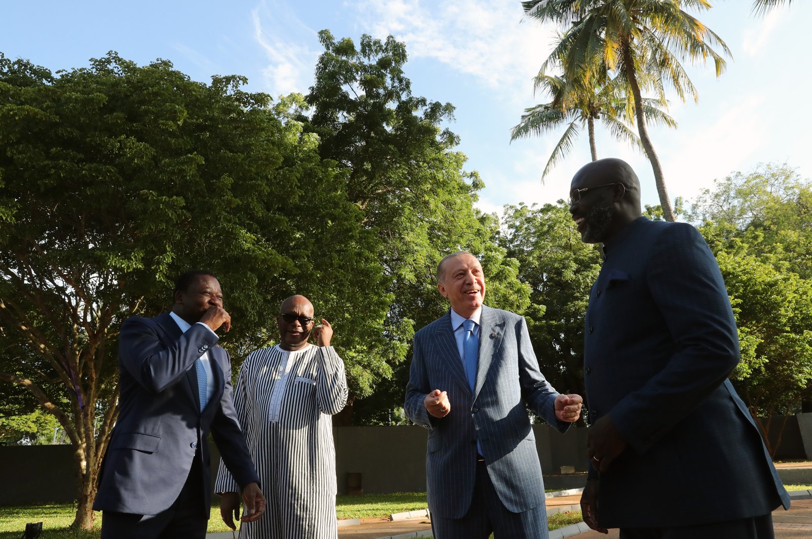 From left to right, Togo President Faure Gnassingbe, Burkina Faso President Christian Kabore, President Recep Tayyip Erdoğan and Liberia President George Weah talk ahead of a working dinner, in Lome, Togo, Oct. 19, 2021. (AA Photo)