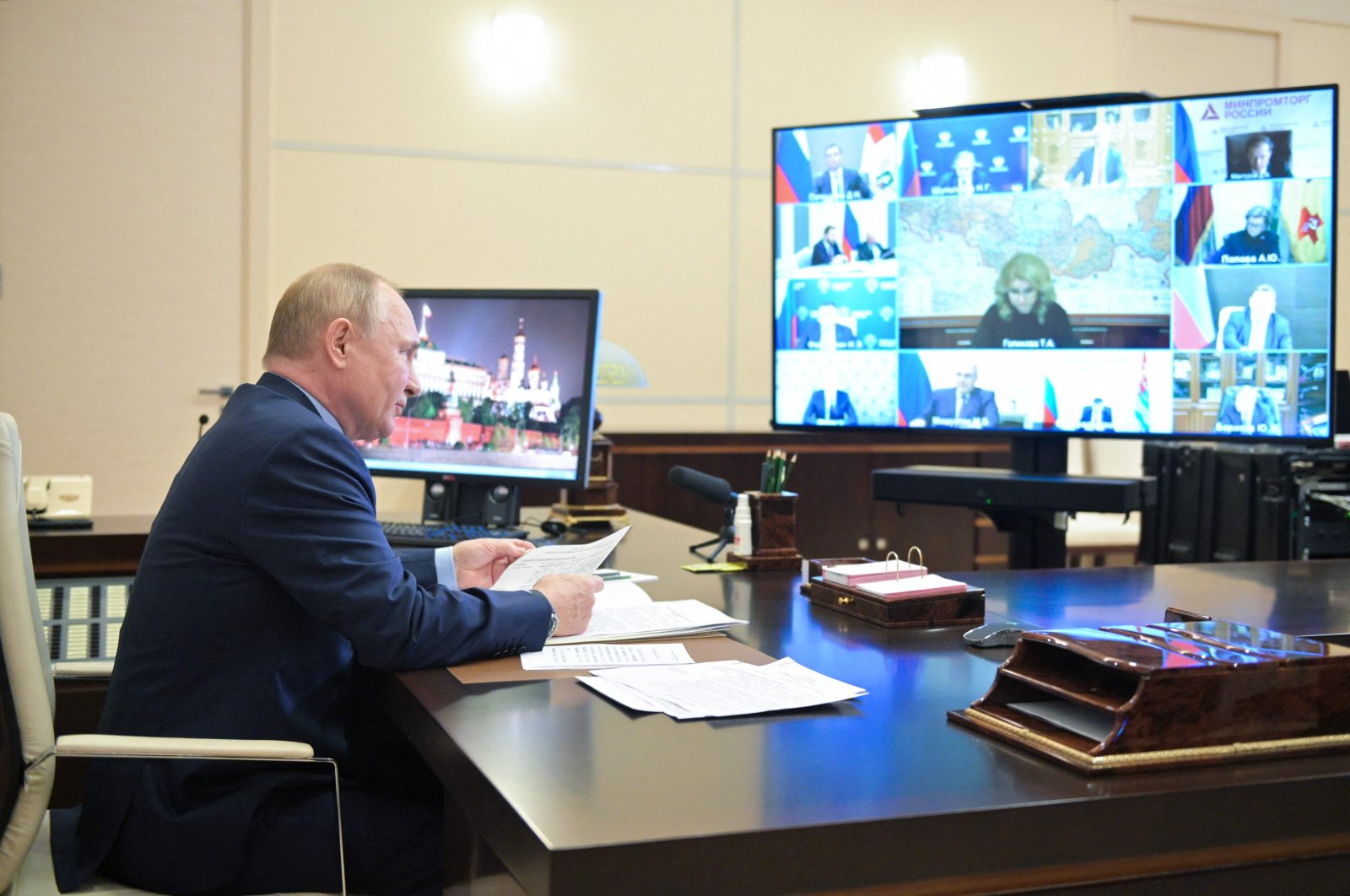 Russian President Vladimir Putin chairs a meeting with members of the government via a teleconference call at the Novo-Ogaryovo state residence outside Moscow on Oct. 20, 2021. (Photo by Alexey Druzhinin / Sputnik / AFP)