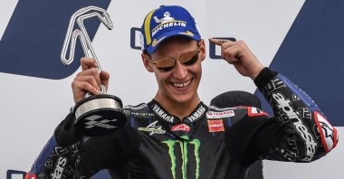 Yamaha's French rider Fabio Quartararo celebrates on the podium after the San Marino MotoGP Grand Prix at the Misano World Circuit Marco-Simoncelli in Misano Adriatico, Italy, Sept. 19, 2021. (AFP Photo)