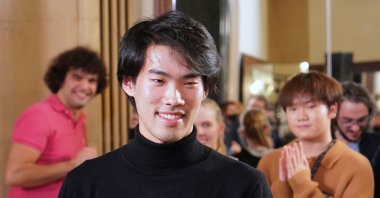 The winner of the 18th Chopin competition Canada's Bruce Xiaoyu Liu smiles after the results were announced in Warsaw, Poland, Oct. 21, 2021. (AFP Photo)