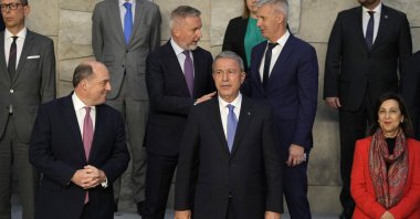 Front row from left, British Defense Minister Ben Wallace, Defense Minister Hulusi Akar and Spain's Defense Minister Maria Margarita Robles Fernandez pose during a group photo of NATO defense ministers at NATO headquarters in Brussels, Thursday, Oct. 21, 2021. (AP File Photo)