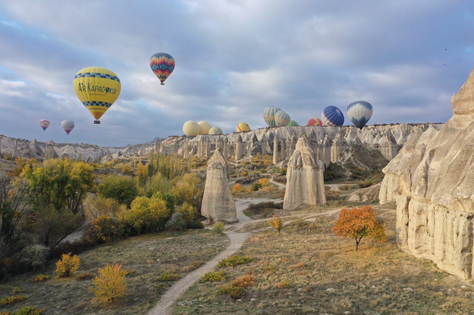 Hot air balloons rise in touristic Cappadocia region, Turkey, Oct. 18, 2021. (AA Photo)