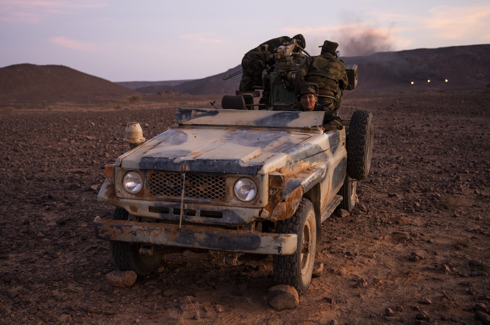 Polisario Front soldiers during a shooting exercise, near Mehaires, Western Sahara, Wednesday, Oct. 13, 2021. (AP Photo)