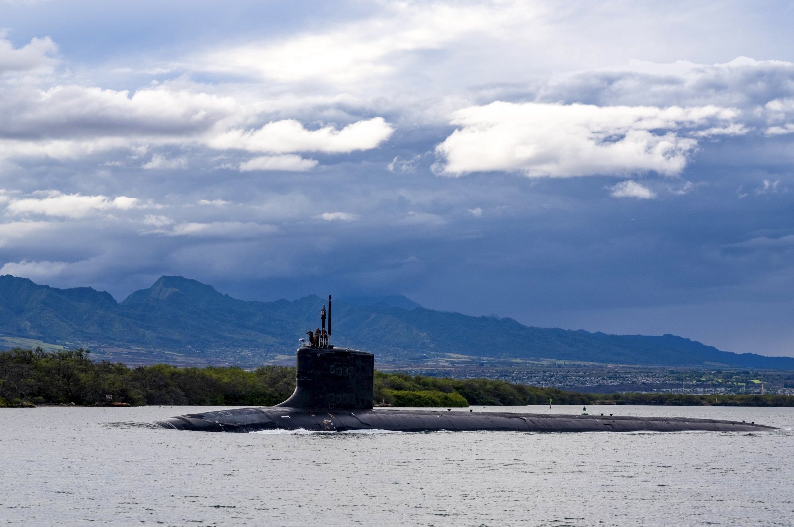The Virginia-class fast-attack submarine USS Missouri (SSN 780) departs Joint Base Pearl Harbor-Hickam for a scheduled deployment in the 7th Fleet area of responsibility, Sept. 1, 2021. (Photo by U.S. Navy via AP)
