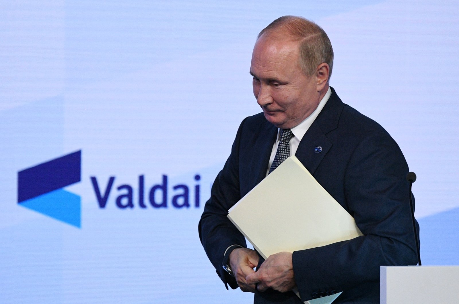 Russian President Vladimir Putin leaves the annual meeting of the Valdai Discussion Club in the Black Sea resort of Sochi, Russia, Thursday, Oct. 21, 2021. (AP Photo)