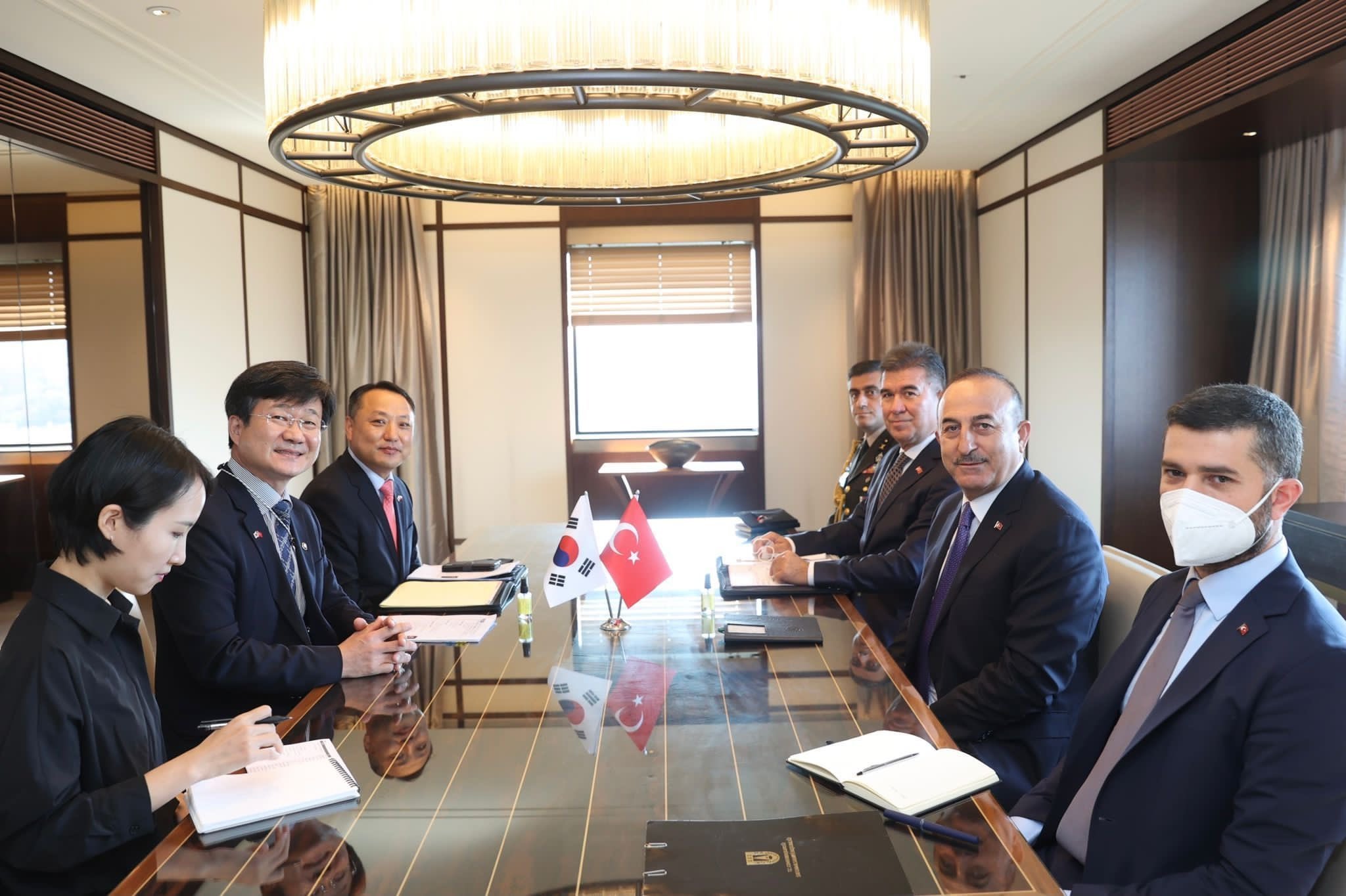 Foreign Minister Mevlüt Çavuşoğlu accompanied by a Turkish delegation during a meeting with a South Korean delegation led by Minister Kang Eun-ho, the minister responsible for the Defense Procurement Program, Seoul, South Korea, Oct. 22, 2021. (DHA Photo)