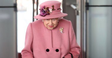 In this file photo taken on Oct. 14, 2021 Britain's Queen Elizabeth II arrives to attend the ceremonial opening of the sixth Senedd, in Cardiff, Wales, U.K. (AFP Photo)