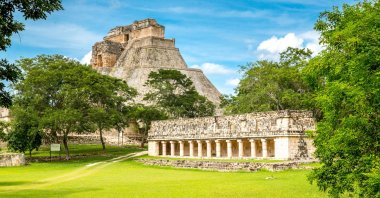 A landscape view showing the ruins of Pre-Hispanic Town of Uxmal in Yucatán Peninsula, Mexico. (Photo by Gettyimages)