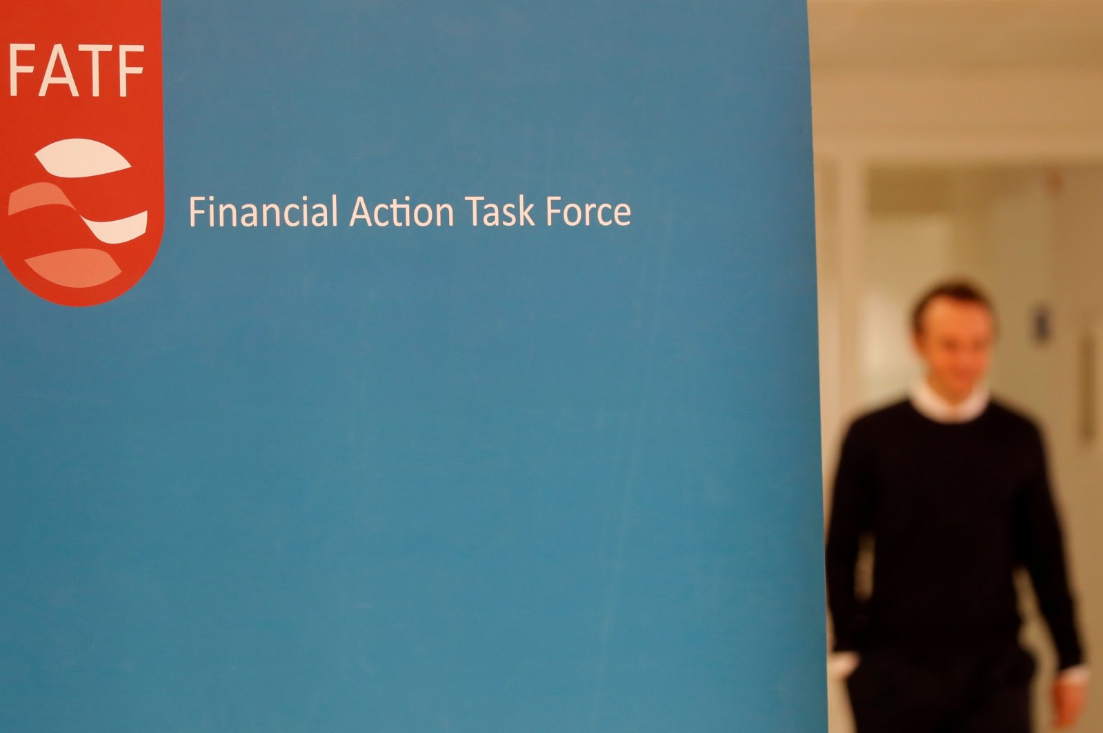 The logo of the Financial Action Task Force (FATF) is seen during a news conference after a plenary session at the OECD headquarters in Paris, France, Oct. 18, 2019. (Reuters Photo)