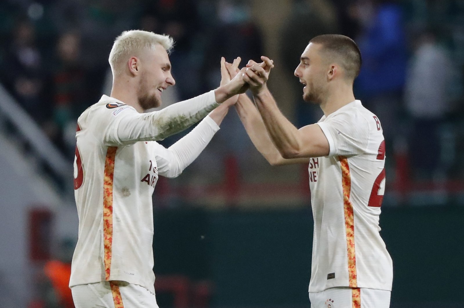 Galatasaray's Victor Nelsson (L) and Berkan Kutlu celebrate after a Europa League match against  Lokomotiv Moscow at the RZD Arena, in Moscow, Russia, Oct. 21, 2021. (Reuters Photo)
