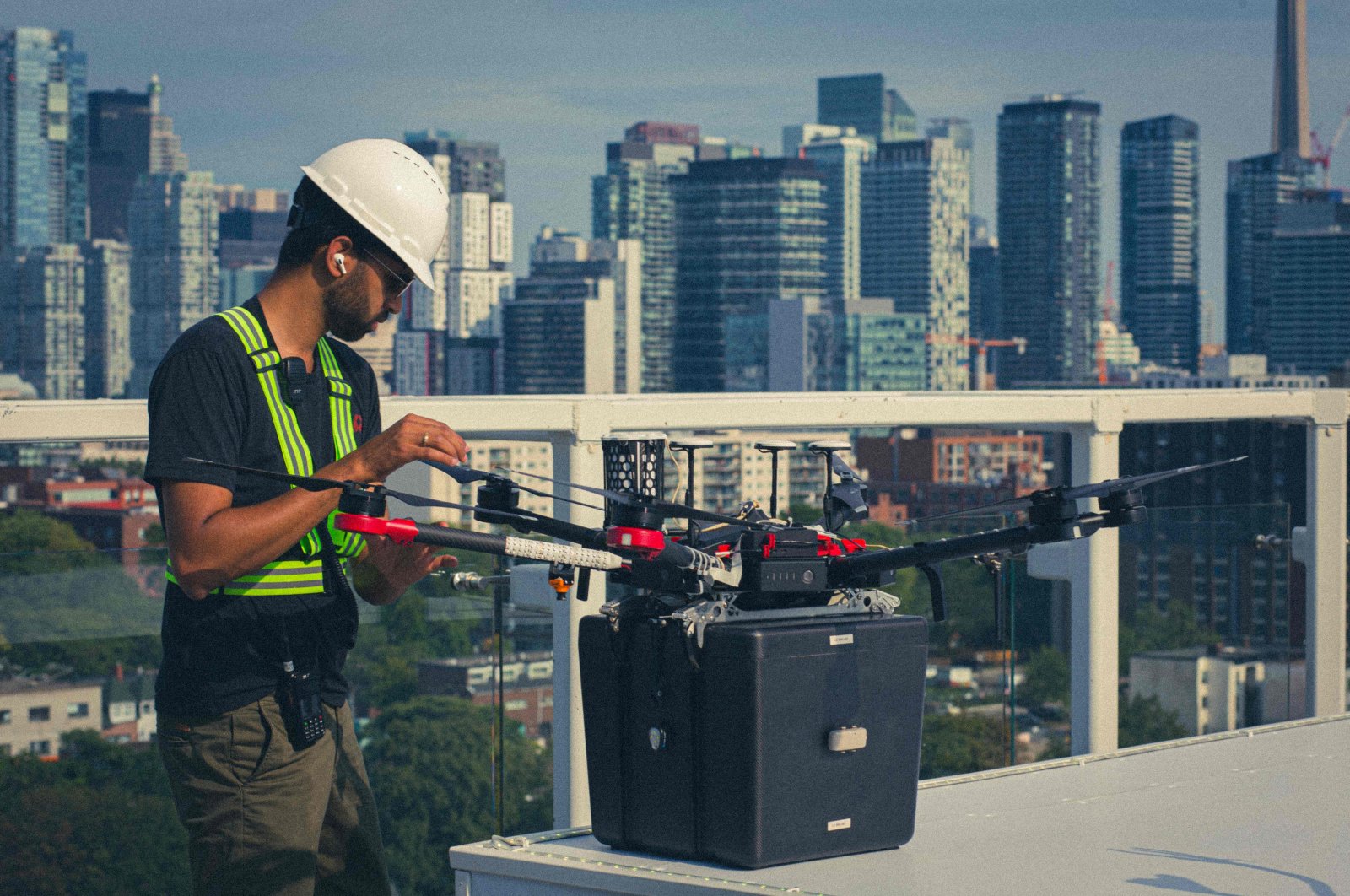 A technician checks Unither Bioelectronique's drone for its historic flight in Toronto, Canada, in this handout photo released by Unither Bioelectronique taken in September 2021. (Unither Bioelectronique via AFP)