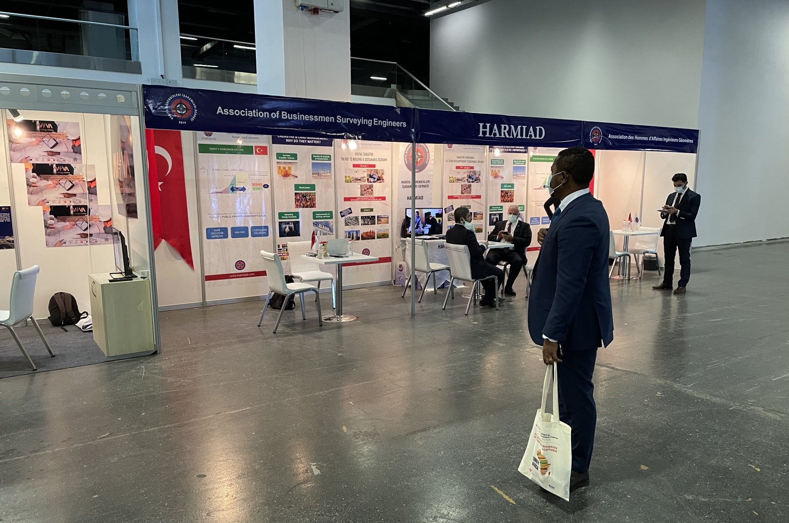 An African man stands near the investment booths at the Turkey-Africa Economic and Business Forum in Istanbul, Turkey, Oct. 21, 2021. (AA Photo)
