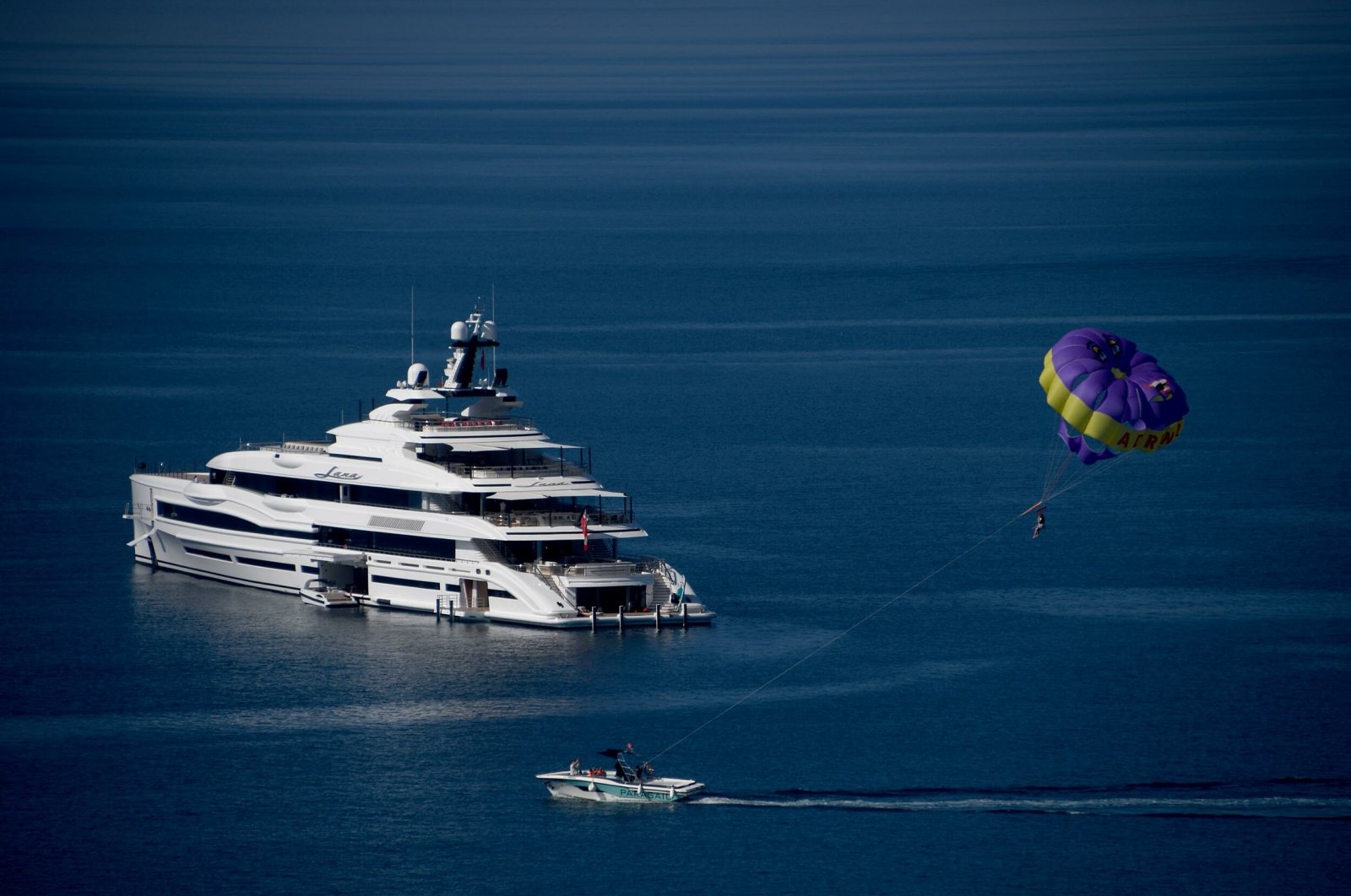 Bill Gates' luxury yacht Lana, along with a catamaran-class logistics support vessel, Wayfinder, off the shores of Aydın, western Turkey, Oct. 22, 2021. (DHA Photo)
