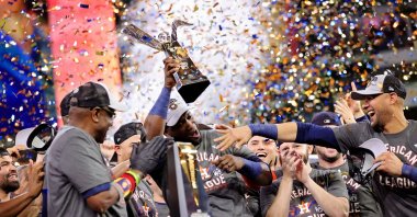 Yordan Alvarez (44) of the Houston Astros celebrates with the League Championship Series Most Valuable Player Award after defeating the Boston Red Sox 5-0 in Game 6 of the American League Championship Series to advance to the World Series at Minute Maid Park, Houston, Texas, U.S., Oct. 22, 2021. (AFP Photo)