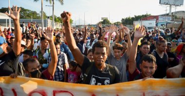 Migrants from Central America and Haiti gesture as they walk in a caravan headed to the Mexican capital to apply for asylum and refugee status, in Tapachula, in Chiapas state, Mexico, Oct. 23, 2021. (Reuters Photo)