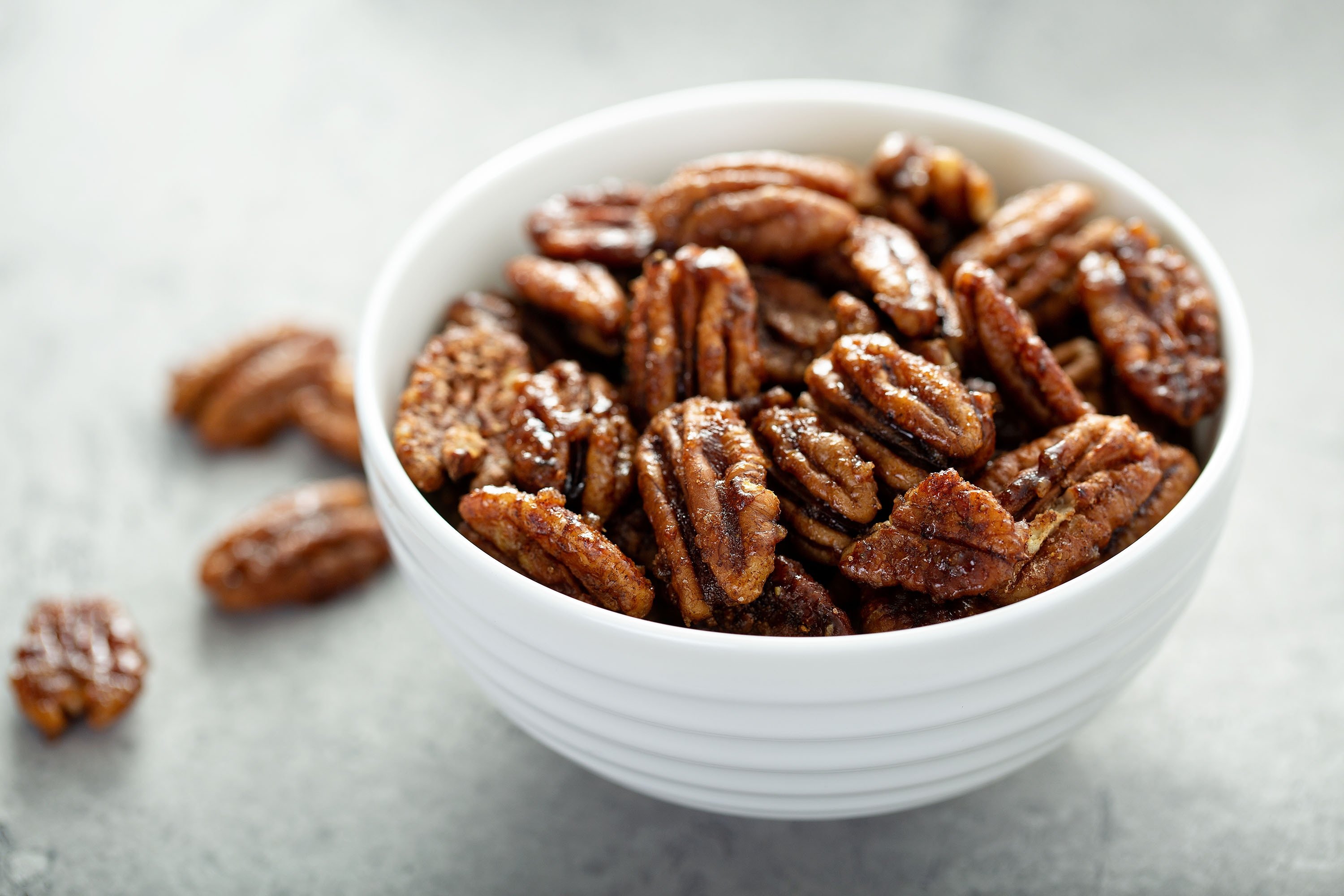 Caramelized candied walnuts in a bowl.  (Photo Shutterstock)