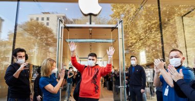 A customer leaves a newly opened Apple store on famed Bağdat Avenue in Istanbul, Turkey, Oct. 22, 2021. (Courtesy of Apple)