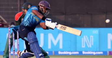 Sri Lanka's Charith Asalanka plays a shot during the ICC men's Twenty20 World Cup match against Bangladesh at the Sharjah Cricket Stadium in Sharjah, United Arab Emirates, Oct. 24, 2021. (AFP Photo)