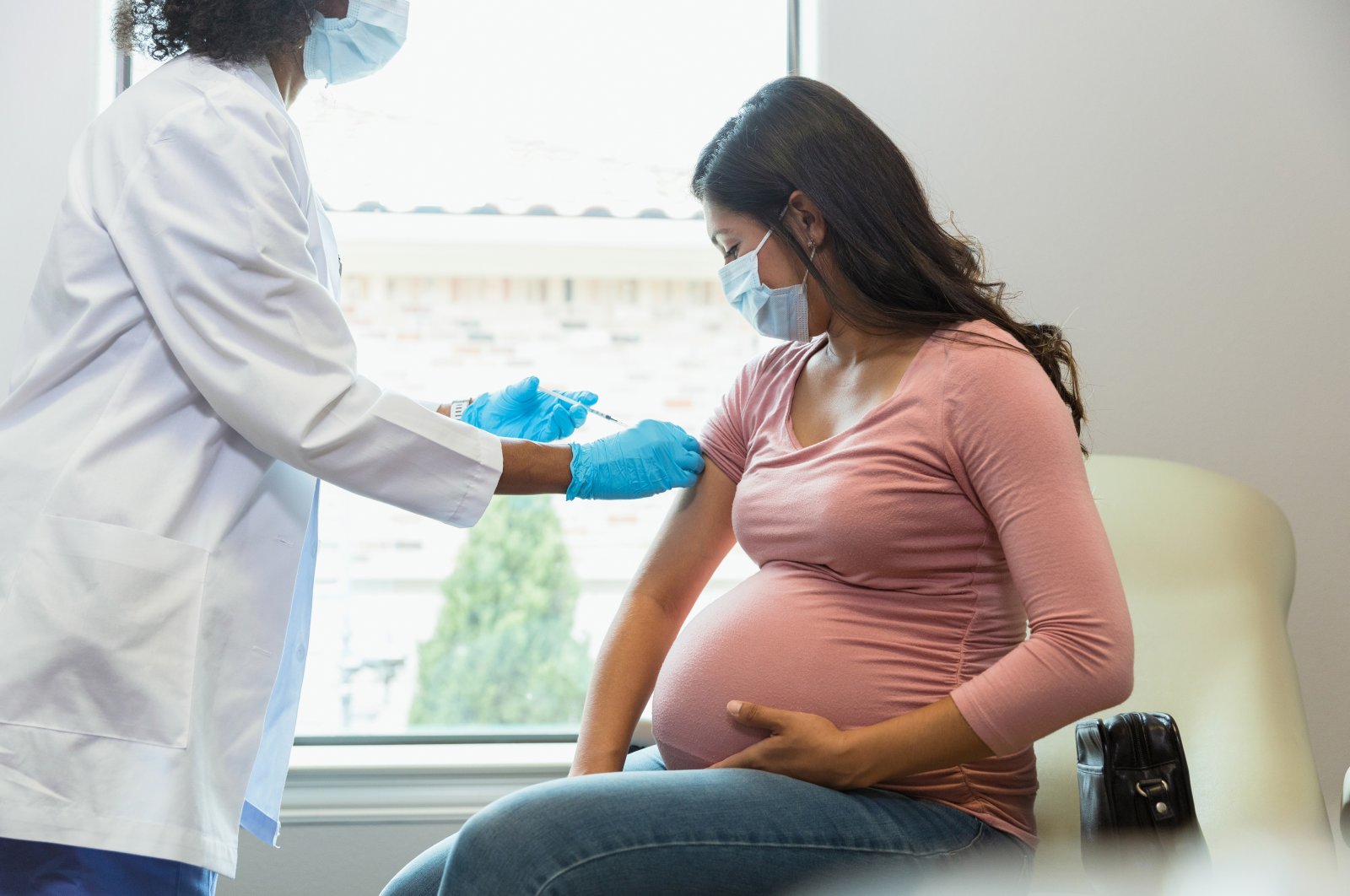 A pregnant woman receives a COVID-19 vaccine. (Getty Images)