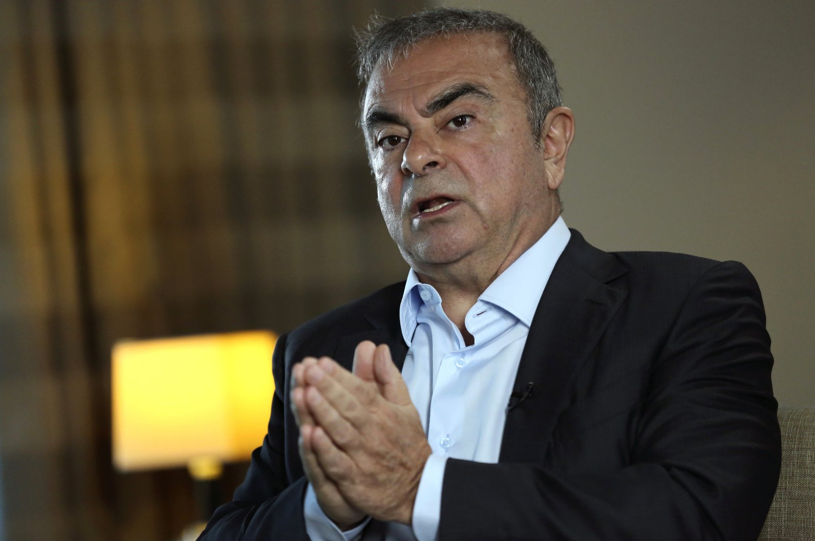 Nissan's former chairperson Carlos Ghosn speaks during an interview, in Dbayeh, north of Beirut, Lebanon, May 25, 2021.