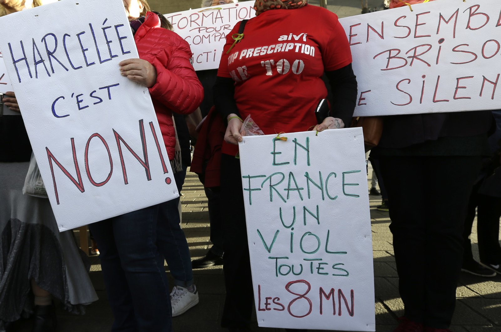 A demonstrator holds placard reading "Harassed it is no," "In France a rape every 8 minutes" and "Together let us break the silence" during a demonstration in Marseille, France, Oct. 29, 2017. (AP Photo)