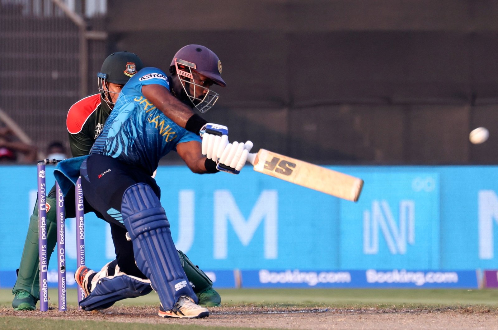 Sri Lanka's Charith Asalanka plays a shot during the ICC men's Twenty20 World Cup match against Bangladesh at the Sharjah Cricket Stadium in Sharjah, United Arab Emirates, Oct. 24, 2021. (AFP Photo)