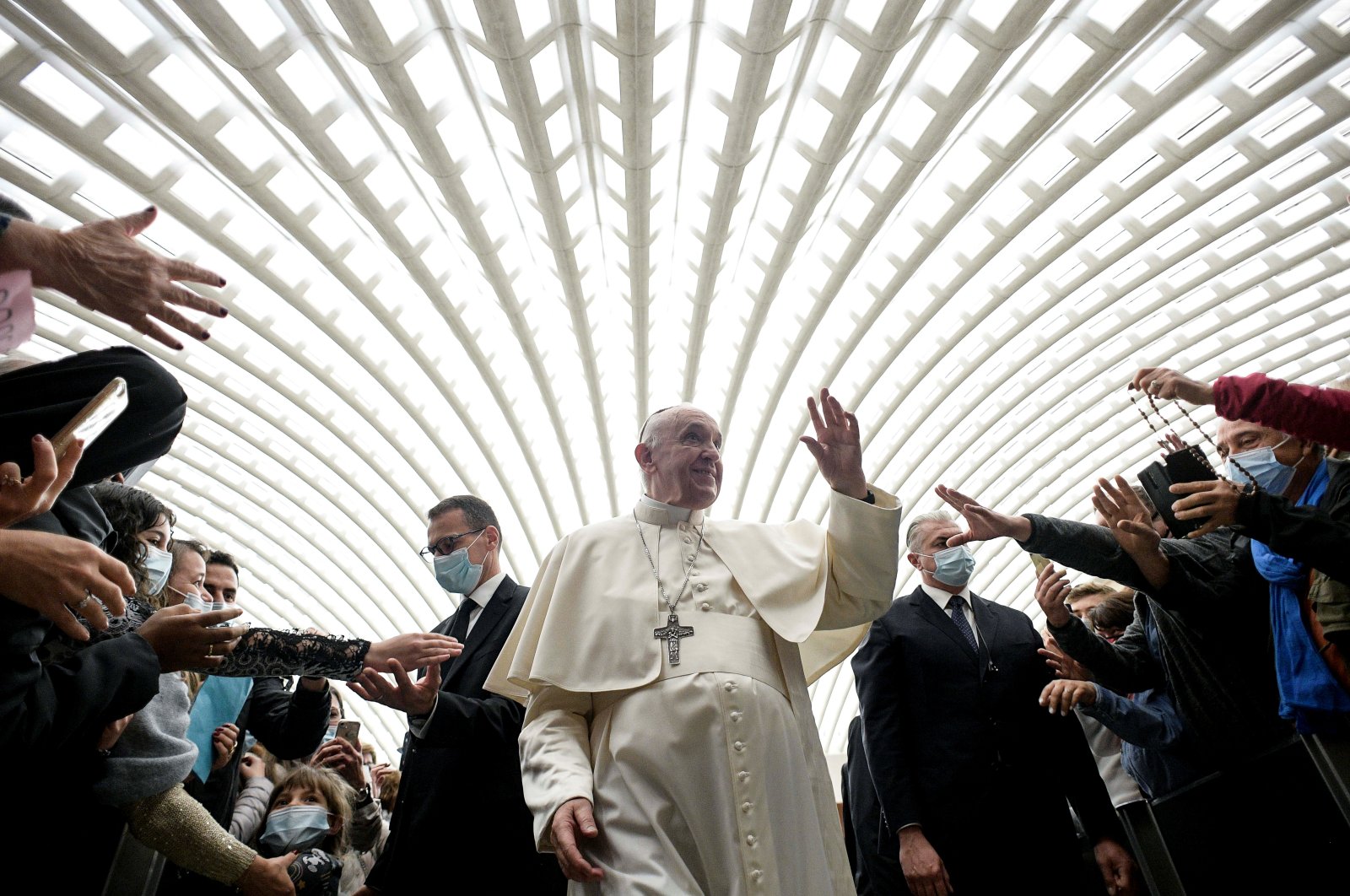 Pope Francis greets people during the weekly general audience at the Vatican, Oct. 20, 2021. (Vatican Media ­Handout via Reuters)