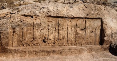 An undated handout picture provided by Terra Di Ninive on October 24, 2021, shows a view of carvings discovered on the walls of an ancient irrigation canal by a team of Kurdish and Italian archaeologists near Faydeh in the Nineveh area of northern Iraq. (AFP Photo)