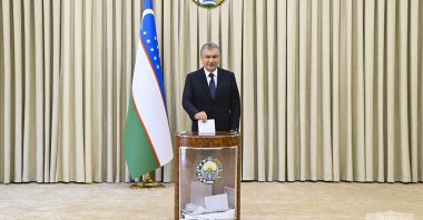 Uzbekistan President Shavkat Mirziyoyev casts his vote in the Uzbek presidential elections at a polling station in Tashkent, Uzbekistan, Oct. 24, 2021. (Uzbekistan President Press Service via EPA-EFE Photo)